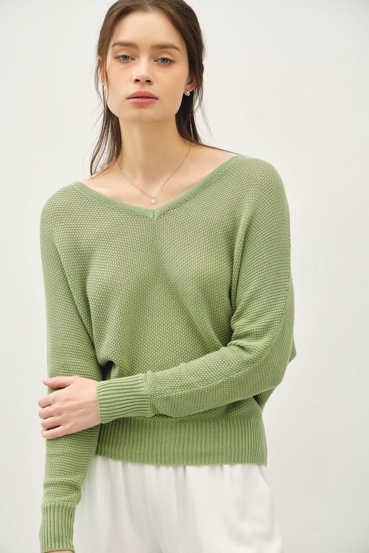 DOUBLE V-NECK BACK BUTTON  DOWN SWEATER