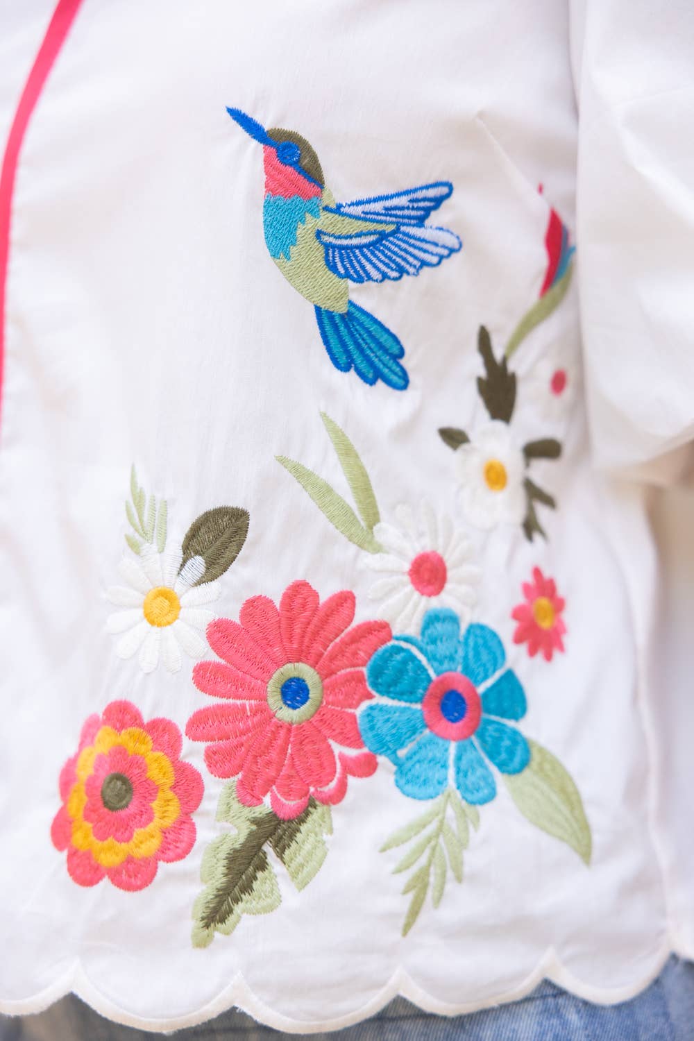 36952 Pipping Detail Floral Hummingbird Embroidered Top