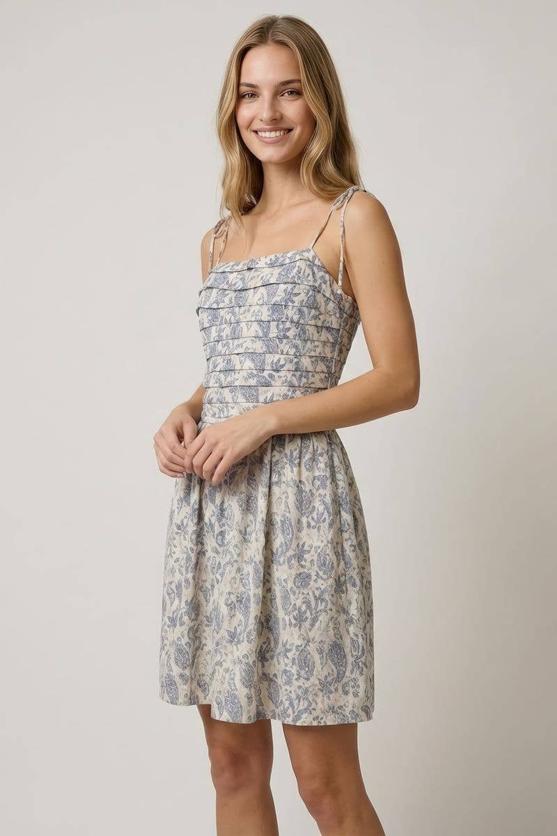 PLEATED TORSO FIT AND FLARE MINI DRESS