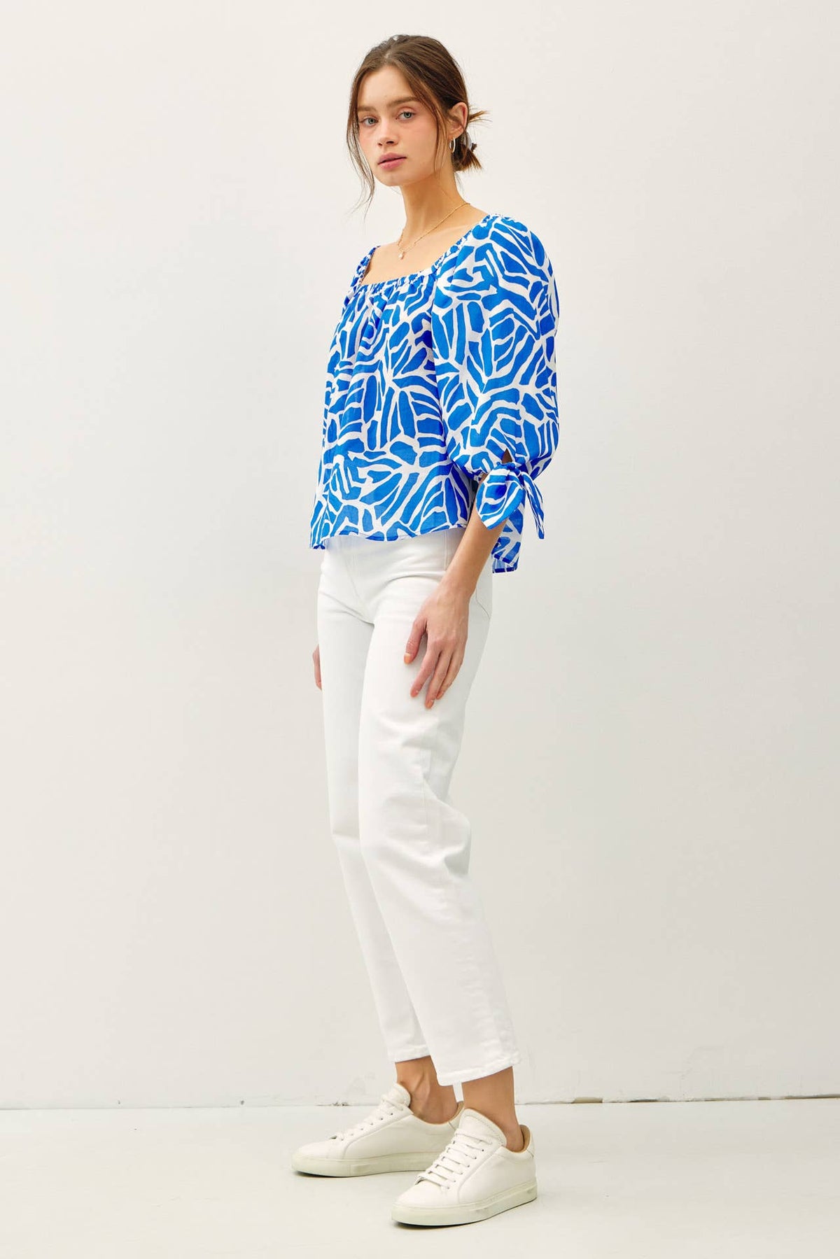 BREEZY, PRINTED 3/4 SLEEVE TOP