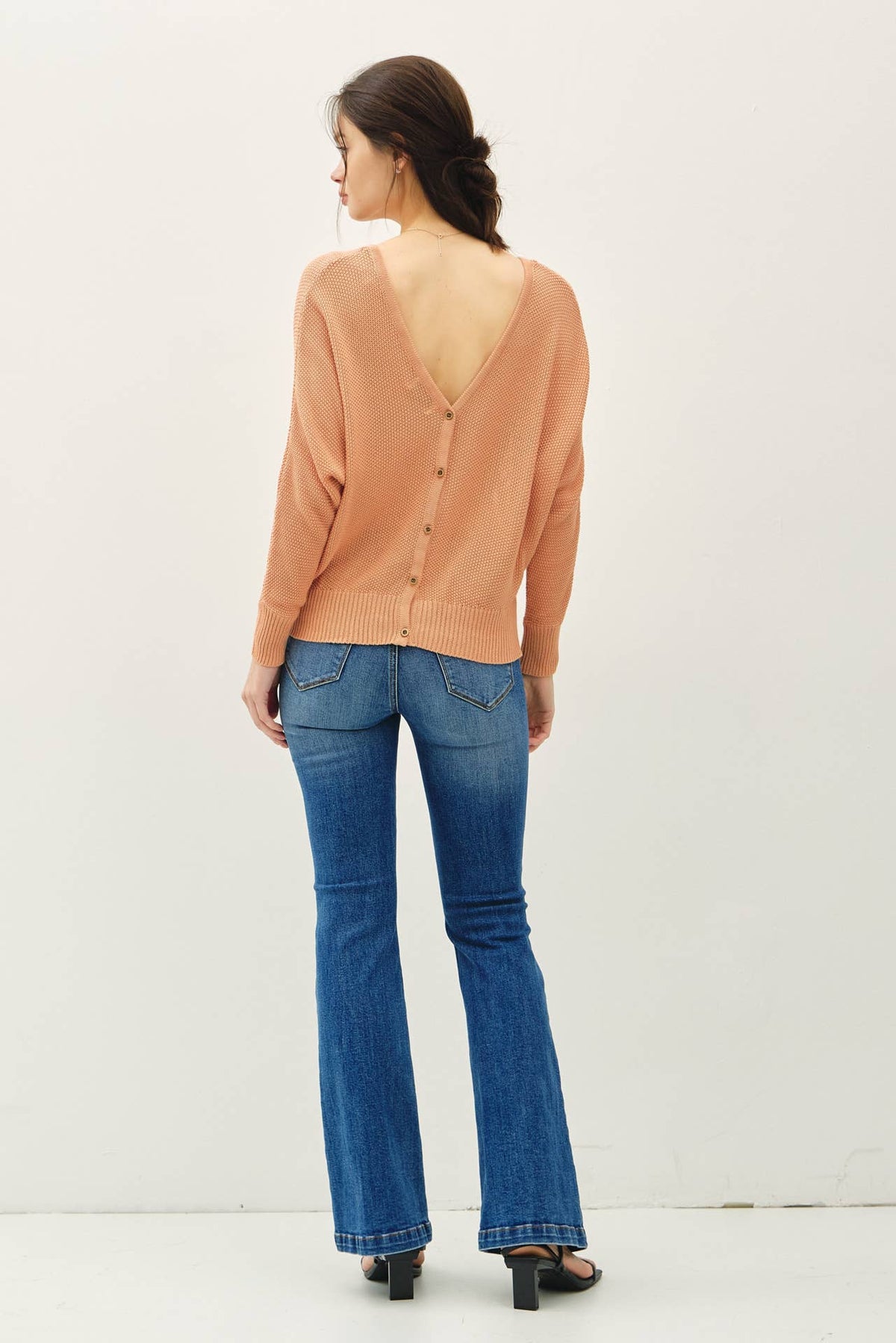 DOUBLE V-NECK BACK BUTTON  DOWN SWEATER