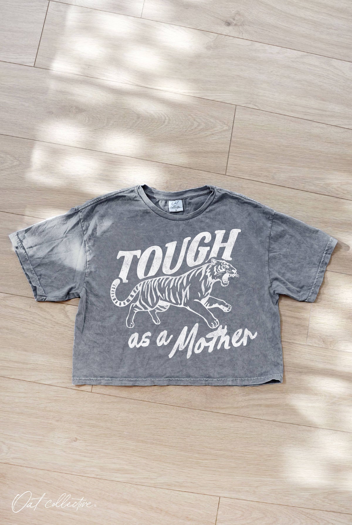 TOUGH AS A MOTHER Cropped Mineral Graphic Top