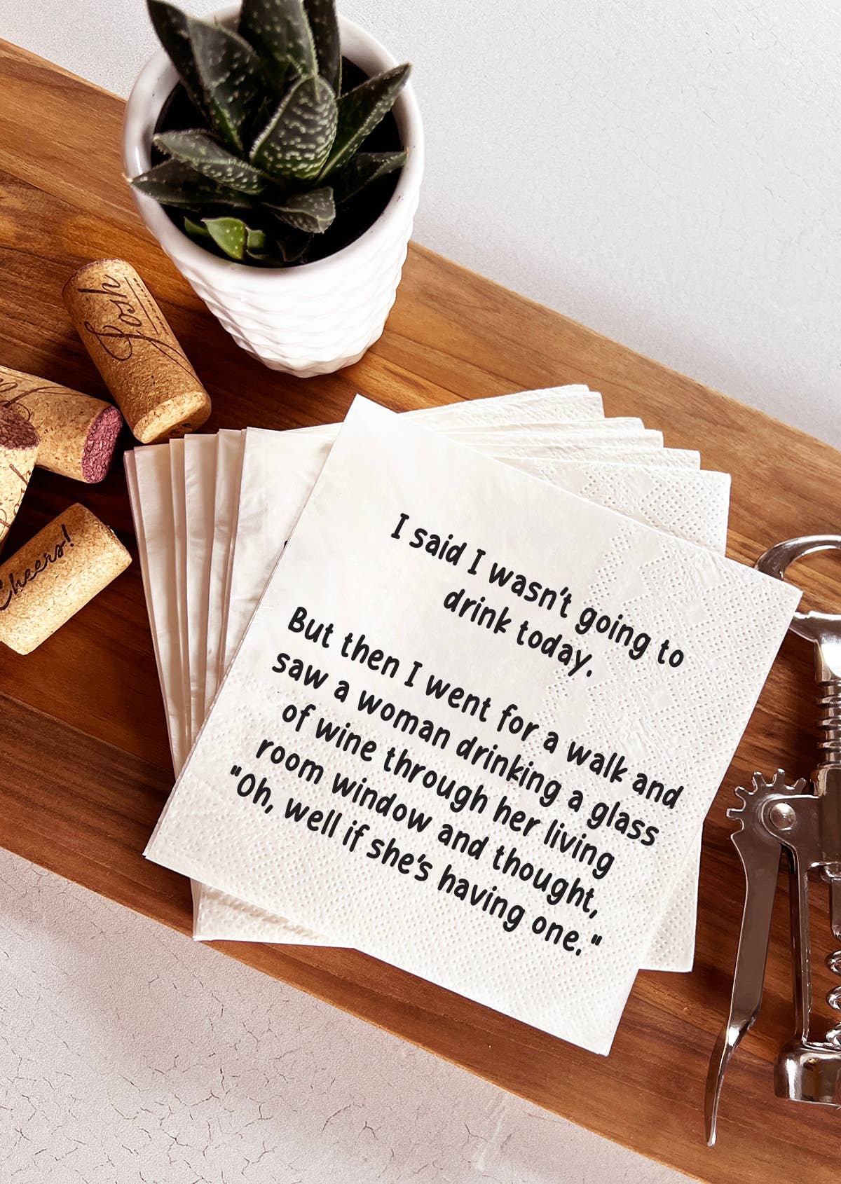 Went for a walk and saw a woman drinking Cocktail Napkins