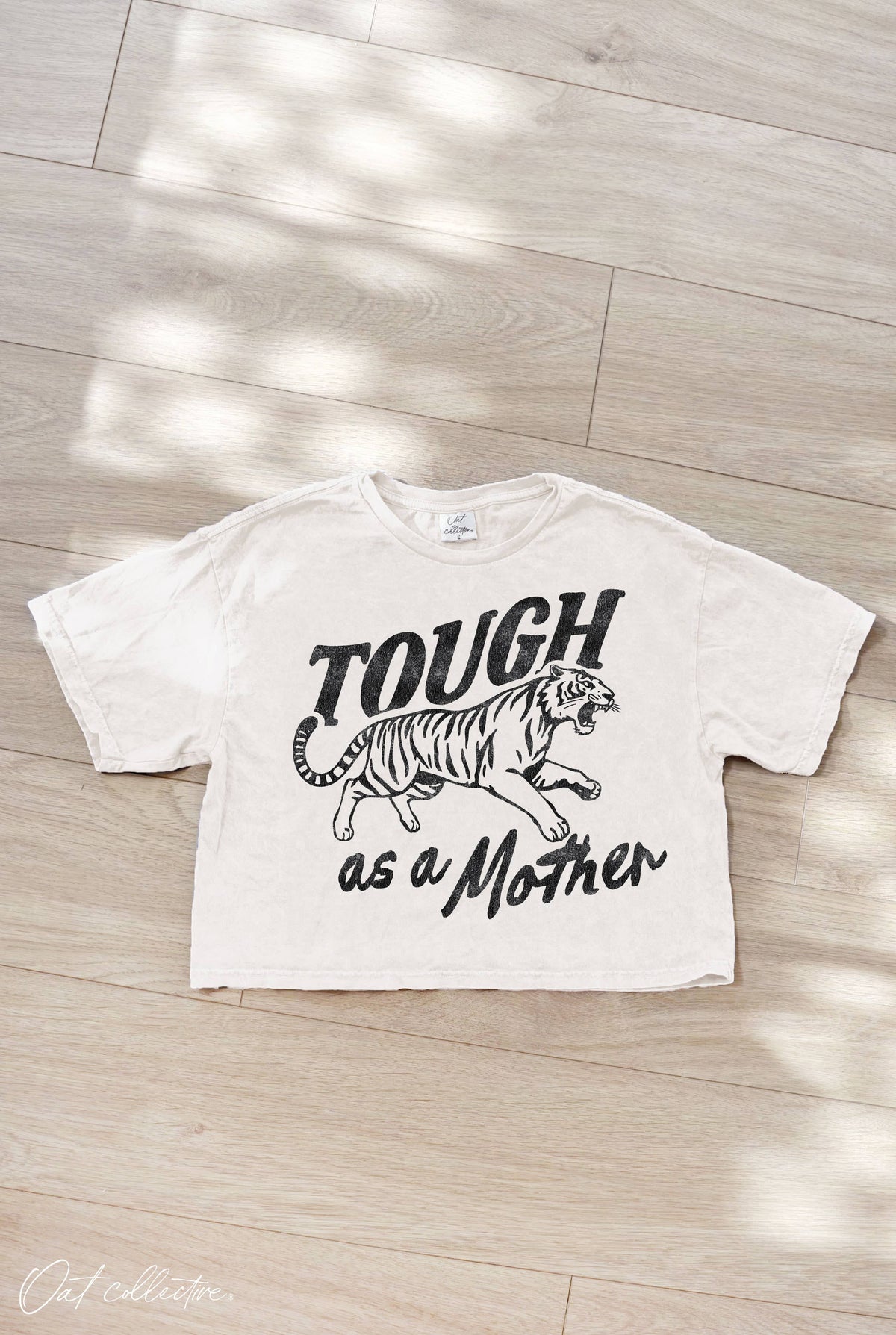 TOUGH AS A MOTHER Cropped Mineral Graphic Top