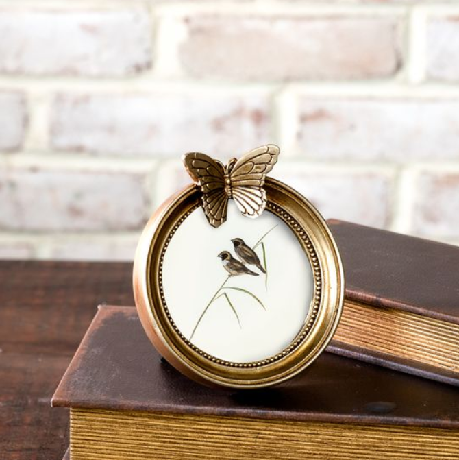 3.5" RD. ANT. GOLD BUTTERFLY PHOTO FRAME
