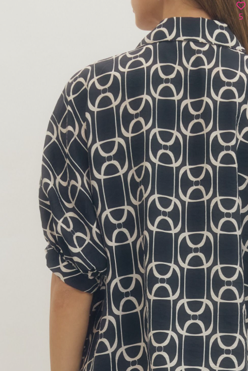 NAVY. Geometric print short sleeve top featuring open stand collar and front button