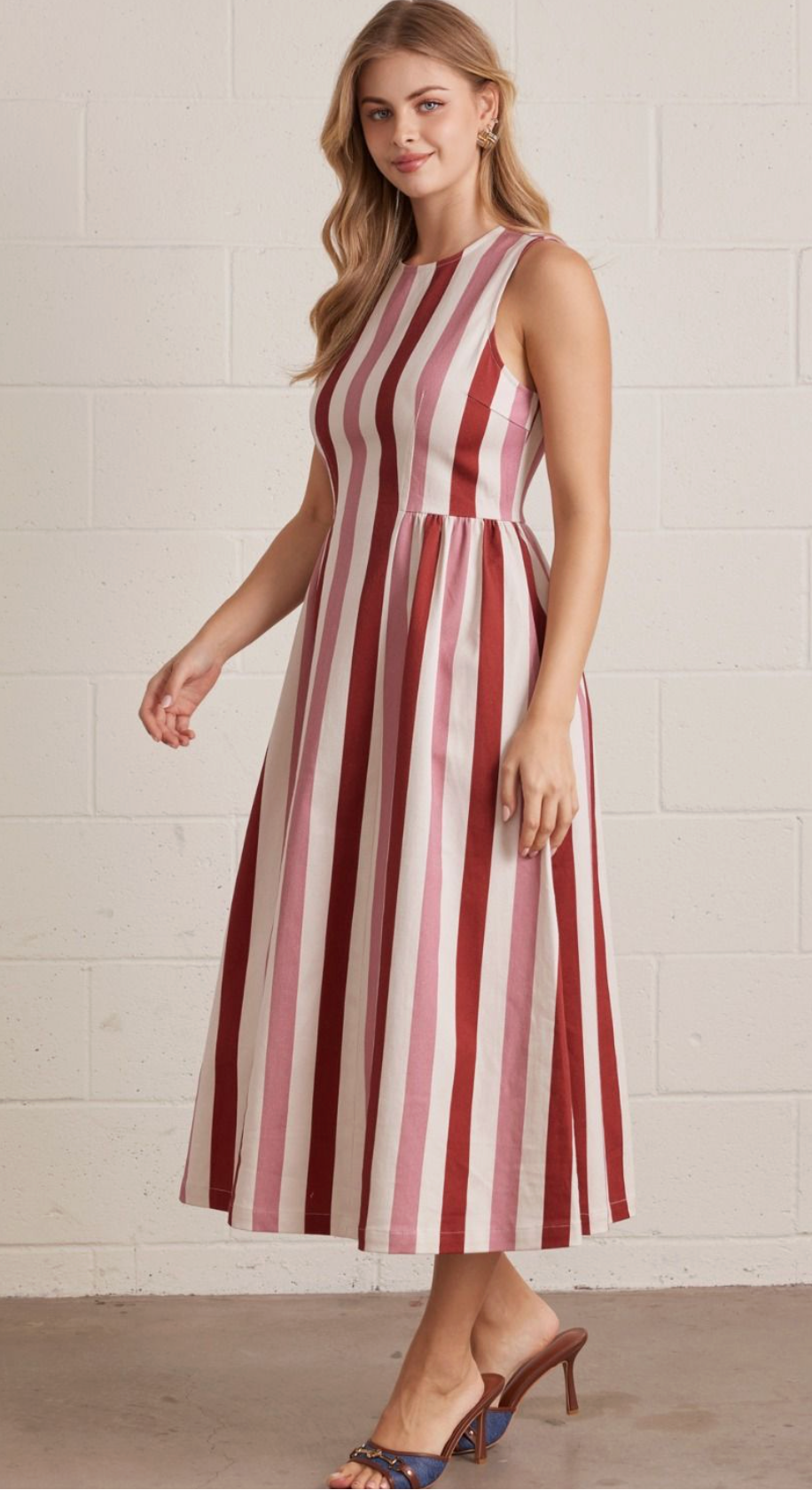 Rustic Combo striped sleeveless midi dress featuring back zipper closure. Side pockets. Unlined. Woven. Non-sheer. Lightweight.