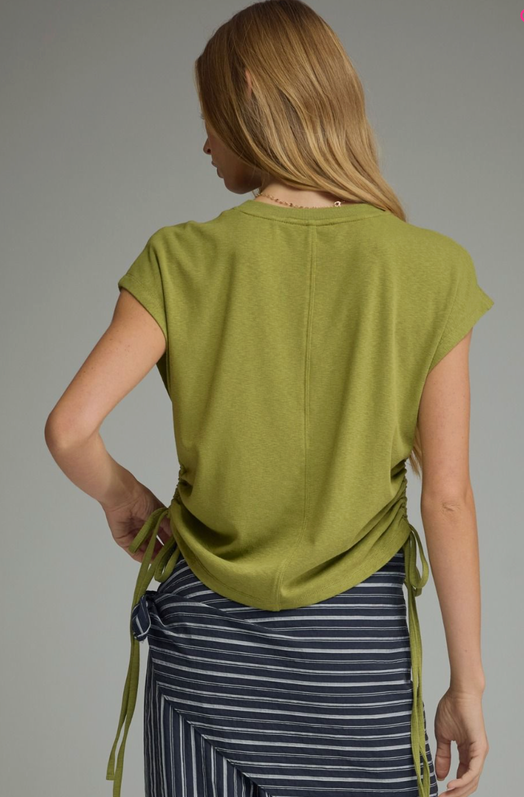 Solid knit cap sleeve top featuring side drawstring ties.