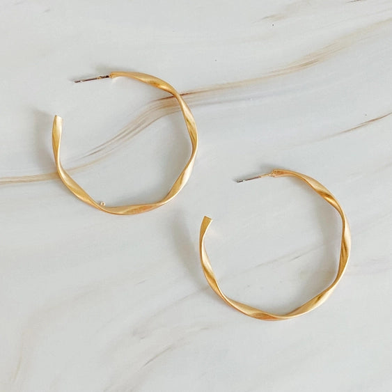 Gold Tone Gentle Wave Sleek Hoop Earrings