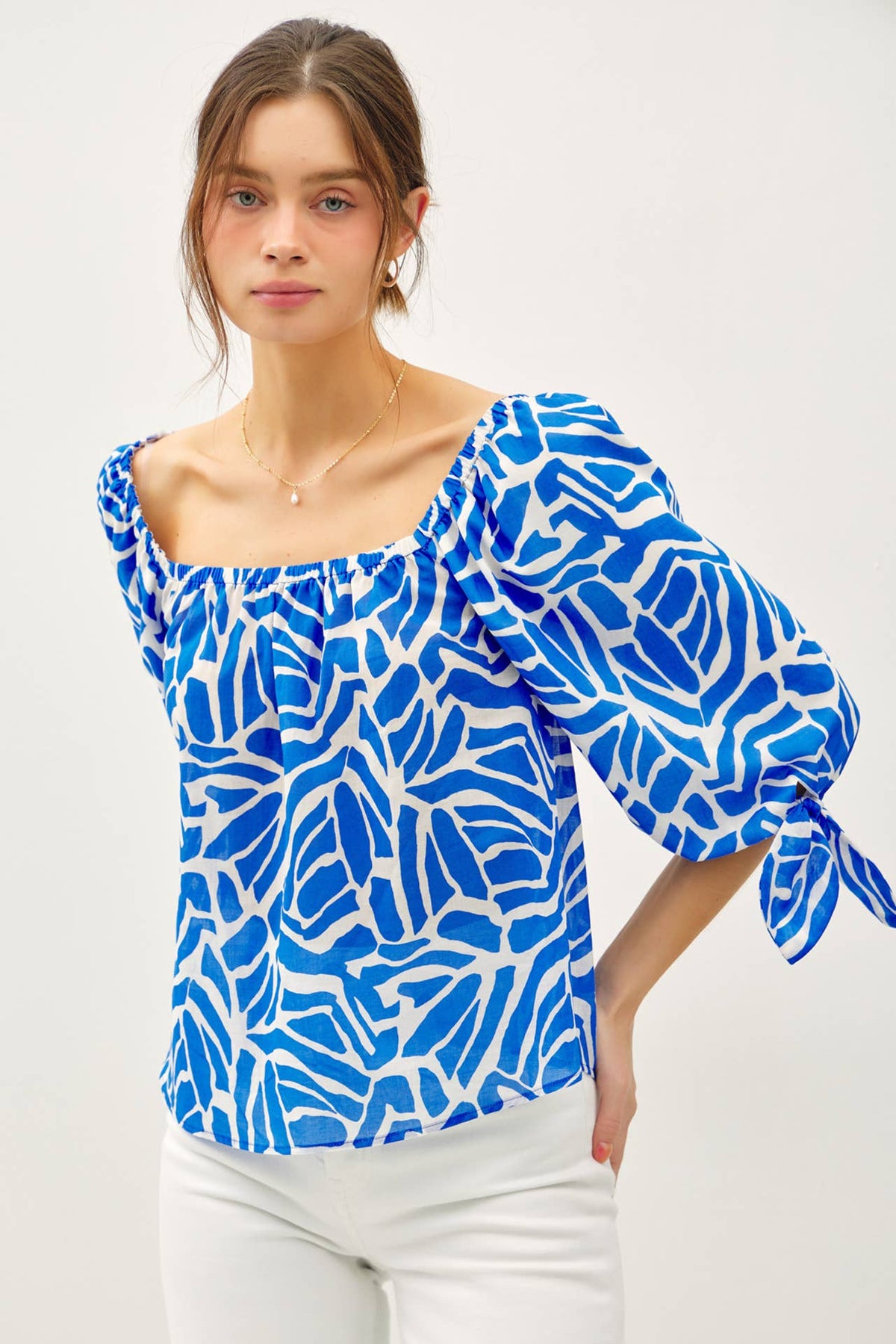 BREEZY, PRINTED 3/4 SLEEVE TOP